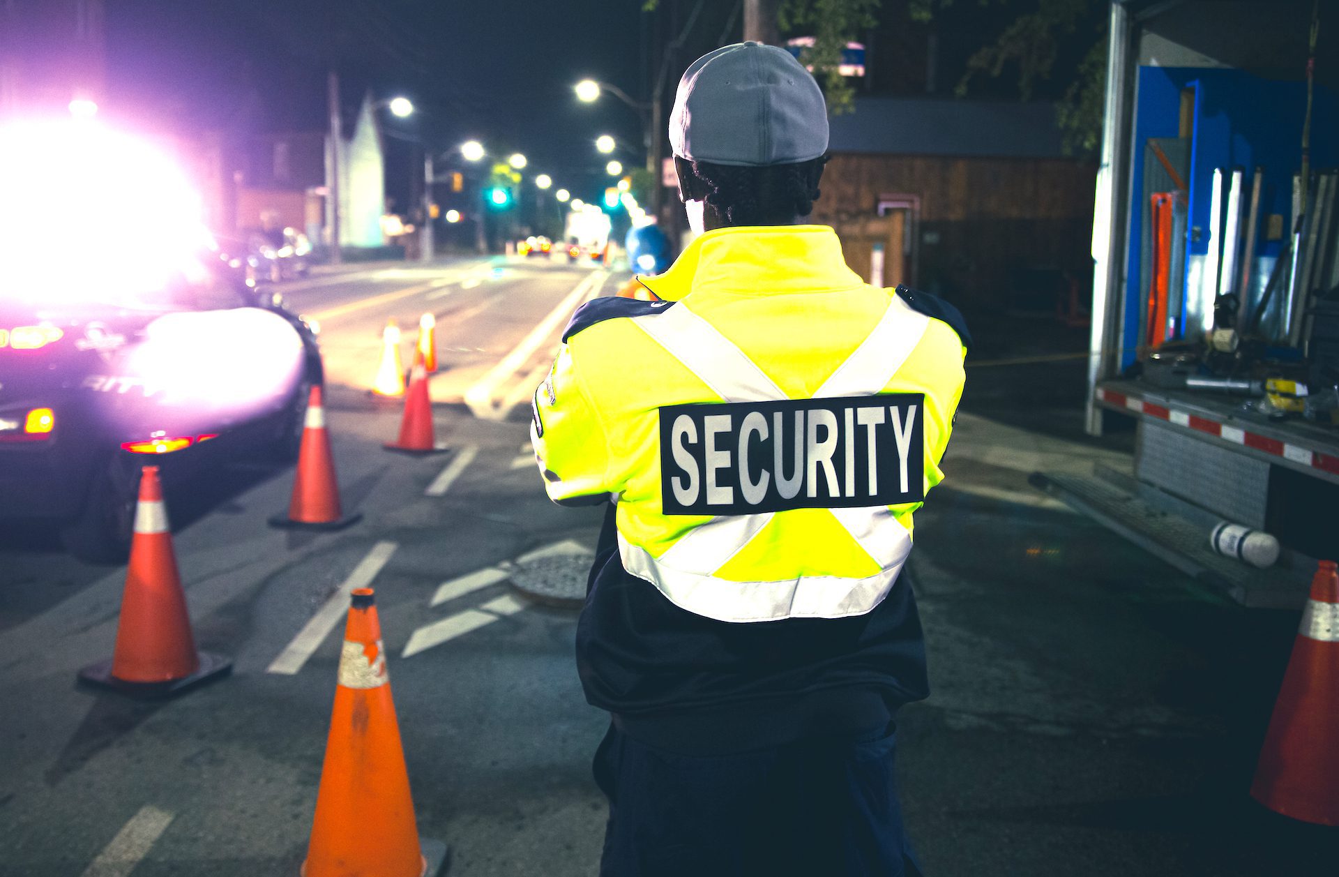 A Flex Point Security guard providing traffic control services at a site in Toronto, Ontario