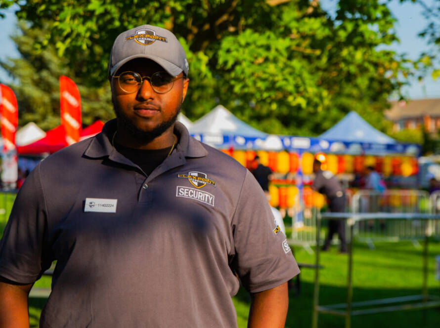 A male Flex point security guard at an Asian Festival in the Greater Toronto Area