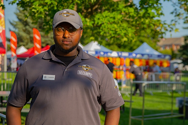 A male Flex point security guard at an Asian Festival in the Greater Toronto Area