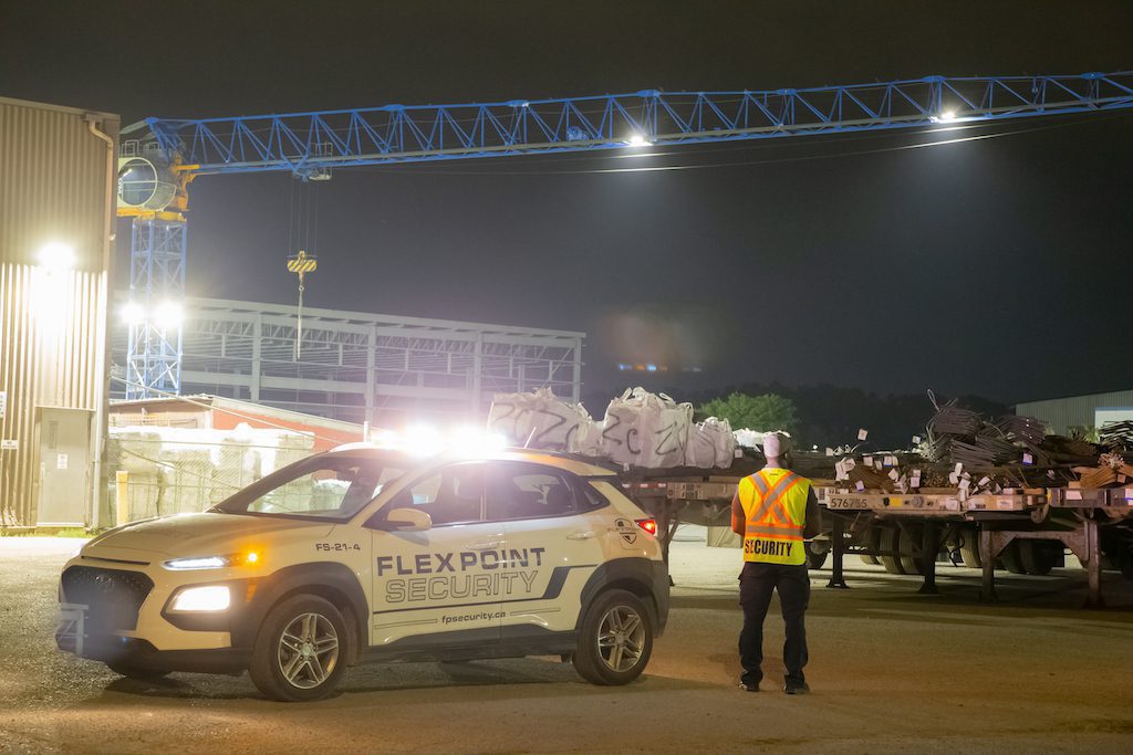 Flex point security guard car and security guard at a warehouse yard